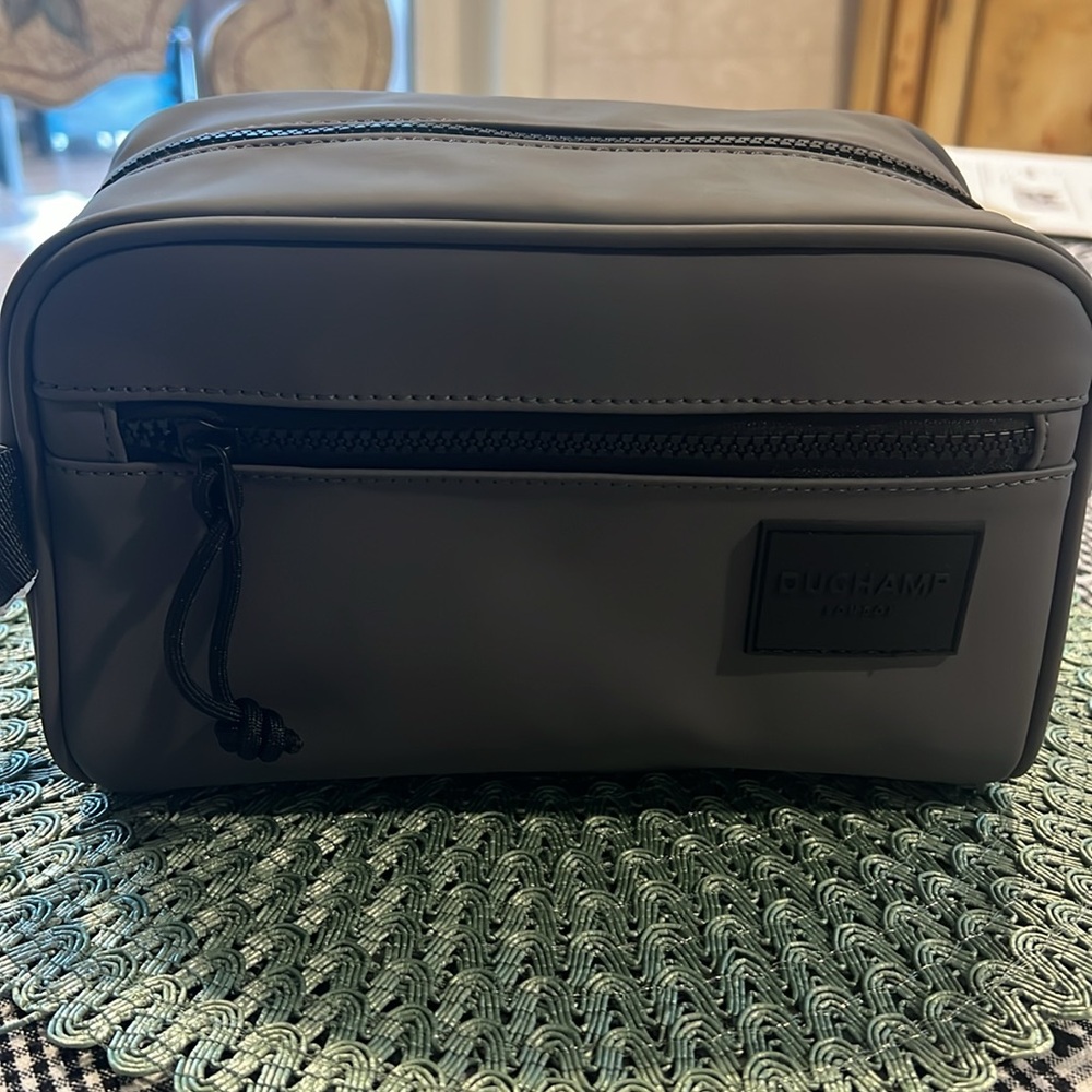 NWT Charcoal Duchamp Dopp Kitt, the ultimate travel companion.